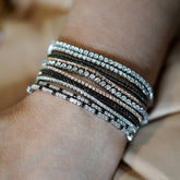 Tennis bracelet with 1.50ct black diamonds in 18K gold